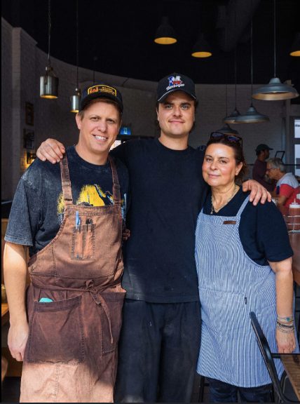 The team behind Golden Horseshoe Barbecue in their Toronto dining room